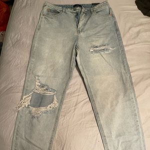 Missguided, light wash, high rise mom jeans. Size 10. Never worn.